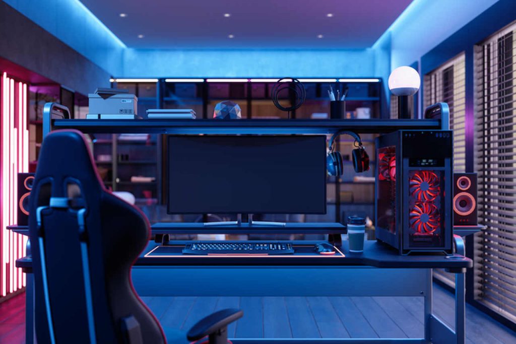 Set-up de pc gamer com monitor grande e luzes azuis